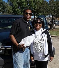 Image courtesy of Missouri City
An MCPD officer, left, accepts a disposal from a resident during a 2016 Drug Take Back Day event.