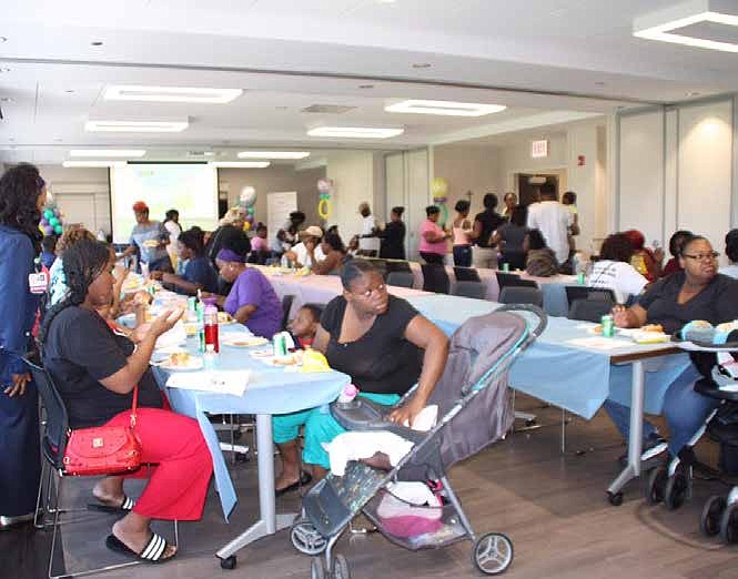 Nearly 100 moms-to-be attended a community baby shower hosted by St. Bernard Hospital.