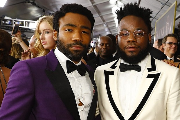 Donald Glover, winner of the Emmy Award for Outstanding Lead Actor in a Comedy Series, with Stephen Glover on the Red Carpet at the 69th Primetime Emmy Awards, Sunday, September 17, 2017.