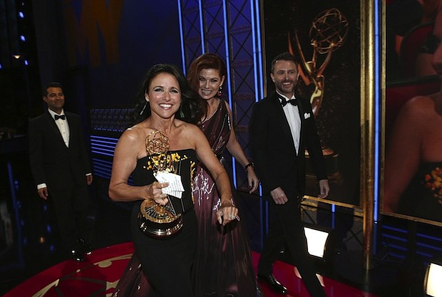 Julia Louis-Dreyfus accepts the Emmy Award for Outstanding Lead Actress in a Comedy Series at the 69th Primetime Emmy Awards, Sunday, September 17, 2017.