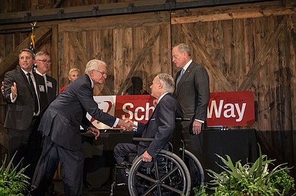 Governor Greg Abbott greets Charles Schwab