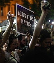 Dozens of people were arrested after a forth night of demonstrations in St. Louis over the acquittal of former police officer Jason Stockley who had been charged with first-degree murder.  Credit: Lawrence Bryant/St. Louis American