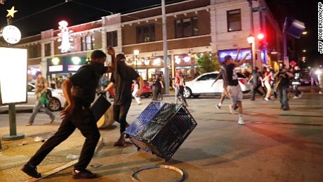 As peaceful protests gave way to violence in St. Louis over the weekend, a group of police officers were heard …