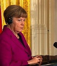 Angela Merkel has won a fourth term as German Chancellor, but with her party's lead in parliament cut and the country facing a surge in support for the far right. (FILE)