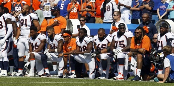 Denver Broncos kneel in protest during the national anthem before their game against the Buffalo Bills. (Photo: Timothy T. Ludwig, USA TODAY Sports)