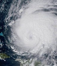 The East Coast is bracing for a possible direct hit from Hurricane Maria, days after the storm caused widespread devastation in the Caribbean.