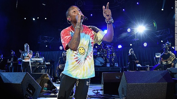 Pharrell performs with The Roots at "A Concert for Charlottesville