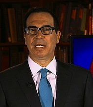 Treasury Secretary Steve Mnuchin said Sunday that NFL owners should decide on a rule on how to handle players who kneel in protest during the national anthem.