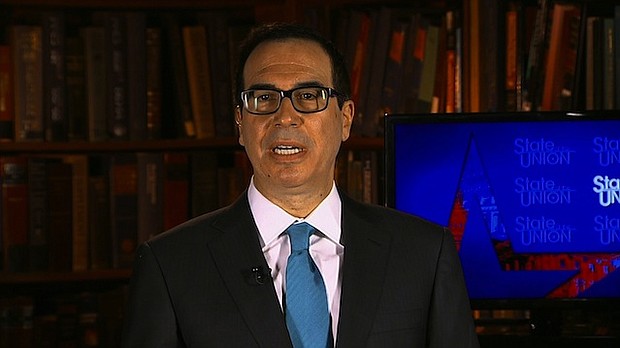 Treasury Secretary Steve Mnuchin said Sunday that NFL owners should decide on a rule on how to handle players who kneel in protest during the national anthem.