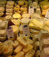A stock image of different types of cheeses taken in Toulouse.