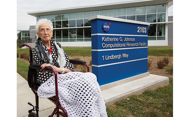 Pioneering mathematician Katherine G. Johnson sits outside the building that now bears her name at NASA’s Langley Research Center in Hampton.