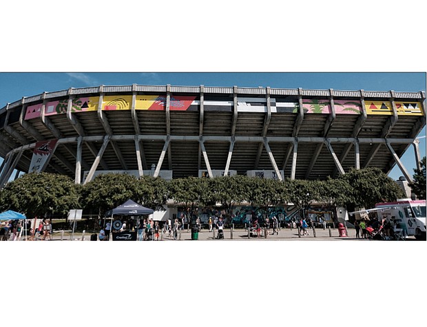 24-carat makeover at The Diamond // The Diamond is no longer rough, thanks to the creativity and skills of local and national artists who gathered at the baseball stadium for the RVA Street Art Festival last weekend. 
