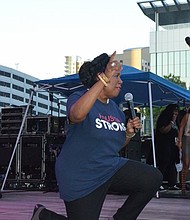 Congresswoman Sheila Jackson Lee taking a knee at the 2017 Houston Black Heritage Fest