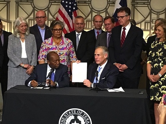 Texas Governor Greg Abbott personally delivered a $50 million check to Houston Mayor Sylvester Turner during a joint press conference …