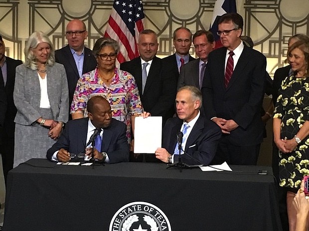 Mayor Sylvester Turner and Gov. Greg Abbott