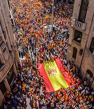Around 250,000 anti-independence Catalans, and supporters from the rest of Spain, marched through the streets of Barcelona on Sunday to protest any moves for a breakaway state.