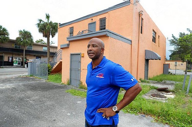 In a Sept. 29, 2017 photo, Miguel Pilgram stands outside of the property in the 1400 block of Sistrunk Boulevard in Fort Lauderdale that he plans to transform into a blues club. Pilgram won a $52 million lottery in Miami-Dade seven years ago. He’s set his sights on Sistrunk Blvd., buying a piece of land and preparing to purchase another. He says he feels a moral obligation to invest in the black community, which has a rich history of activism and passion. (South Florida Sun-Sentinel via AP Mike Stocker)