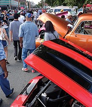 eye-catching classic cars and trucks stop traffic near 2nd and Marshall streets.