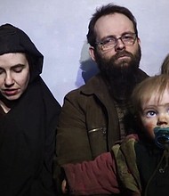 Joshua Boyle, his American wife Caitlan Coleman and their three children - A couple freed from militant captivity in Pakistan were on a flight to London on Friday, a Pakistani military source said.