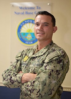 Petty Officer 1st Class Anthony Mugavero is a master-at-arms serving with the Naval Base Guam.