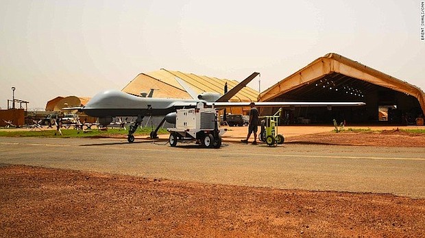 A rare look at a MQ-9 Reaper as it is prepped for flight outside of its hanger. "This aircraft provides very unique capabilities that apply very well in Africa," says US Air Force Col. John Meiter.  "It brings a lot of information gathering capabilities and has very long endurance. We had a period several months ago where this was in the air longer than it was on the ground.
Source:	Brent Swails/CNN