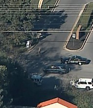 Aerial view of law enforcement vehicles after a shooting at a business park in Edgewood, Maryland, on October 18, 2017.
