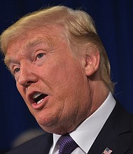 President Donald Trump delivers a speech about immigration, the economy and cultural issues to The Heritage Foundation in Washington on October 17, 2017.  