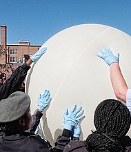 High aptitude //
Major Norman Marshall, Franklin Military School’s chemistry and computer science teacher, right, and his students work to launch a high-altitude weather balloon into the Earth’s upper atmosphere Tuesday at the East End school. The balloon is part of the team’s KnightSky project, which was started two years ago.