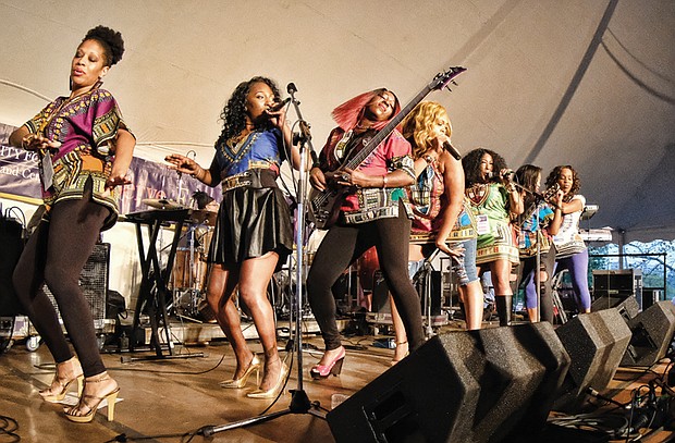 Folk Festival turns up lively music, crowd // Thousands of people enjoyed the festive atmosphere of this year’s Folk Festival, which, as always, featured a variety of music genres. Washington D.C.’s Be’la Dona go-go band displays music girl power on stage.