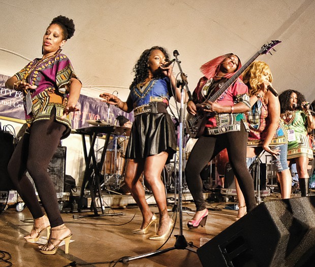 Folk Festival turns up lively music, crowd // Thousands of people enjoyed the festive atmosphere of this year’s Folk Festival, which, as always, featured a variety of music genres. Washington D.C.’s Be’la Dona go-go band displays music girl power on stage.
