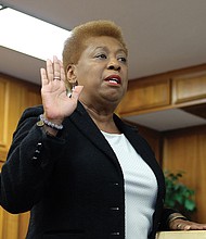 Cheryl Burke, a former Richmond Public Schools principal, is sworn in Oct. 7 as the new 7th District School Board representative at City Hall.
