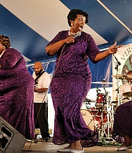  Folk Festival turns up lively music, crowd // The Legendary Ingramettes, below center, rouse the audience and warm the soul with their gospel sounds. 