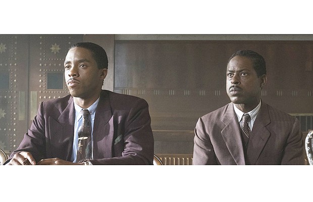 Chadwick Boseman, left, portrays Thurgood Marshall defending Joseph Spell, played by Sterling K. Brown in movie “Marshall.”