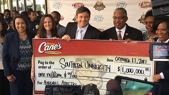 Raising Cane’s presented Southern University with a $1 million donation during an announcement of a partnership between the university and …