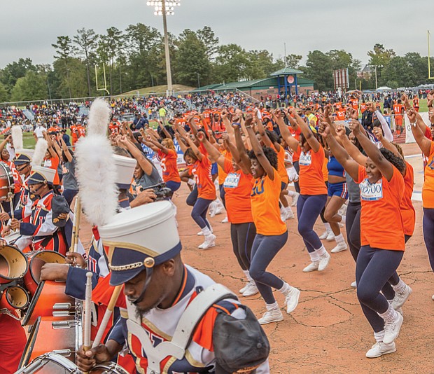 VSU celebrates homecoming //  the Virginia State Trojan Explosion Marching Band and The Woo Woos, including current and former squad members, keep the crowd in the game. 