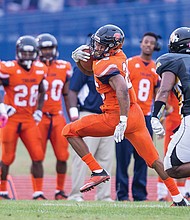 VSU’s Trenton Cannon evades a Bowie State defender Saturday in Ettrick. 