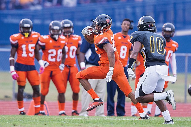 VSU’s Trenton Cannon evades a Bowie State defender Saturday in Ettrick. 