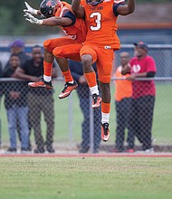 VSU celebrates homecoming //  The real action was on the field where jubilant VSU football players leap, above right, while keeping intact their winning streak. The Trojans beat Bowie State 47-35 before a festive homecoming audience of more than 17,000.
