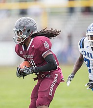 VUU’s Chazton McKenzie, left, carries the ball Saturday with Chowan’s Bryan Bryant in close pursuit.