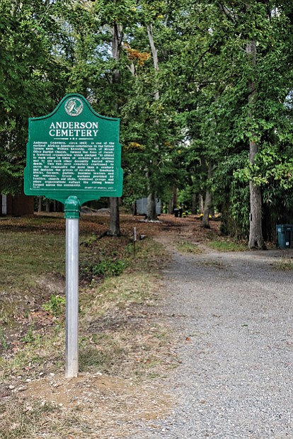 
Historical marker dedicated //
A marker noting the historical significance of Anderson Cemetery in Henrico County now stands at Portsmouth Street and New York Avenue in Glen Allen at the cemetery’s entrance. The marker was dedicated Tuesday in a ceremony held by the Friends of Anderson Cemetery, a group working to clean up and maintain the burial grounds that date to the mid-1800s. The 2-acre site served as one of the earliest cemeteries for African-Americans in the Yellow Tavern area. From obituary notices, roughly 200 people were buried in the cemetery over the course of a century, with one of the earliest graves dating back to 1881, organizers said. Many were members of Mount Olive Baptist Church, St. Peter Baptist Church and other churches in the area. A new nonprofit, Anderson Cemetery League, is working toward permanent stewardship of the cemetery.