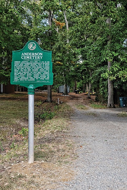 
Historical marker dedicated //
A marker noting the historical significance of Anderson Cemetery in Henrico County now stands at Portsmouth Street and New York Avenue in Glen Allen at the cemetery’s entrance. The marker was dedicated Tuesday in a ceremony held by the Friends of Anderson Cemetery, a group working to clean up and maintain the burial grounds that date to the mid-1800s. The 2-acre site served as one of the earliest cemeteries for African-Americans in the Yellow Tavern area. From obituary notices, roughly 200 people were buried in the cemetery over the course of a century, with one of the earliest graves dating back to 1881, organizers said. Many were members of Mount Olive Baptist Church, St. Peter Baptist Church and other churches in the area. A new nonprofit, Anderson Cemetery League, is working toward permanent stewardship of the cemetery.