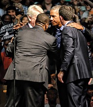 Former President Obama electrifies the crowd as he huddles with Virginia’s top ticket Democratic candidates at an Oct. 19 rally at the Greater Richmond Convention Center.