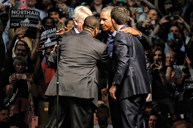 Former President Obama electrifies the crowd as he huddles with Virginia’s top ticket Democratic candidates at an Oct. 19 rally at the Greater Richmond Convention Center.