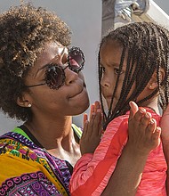 Sparking the imagination // The 13th annual festival, sponsored by the City of Richmond, celebrates diversity in the Richmond community. The festival featured an array of food, exhibits, arts and crafts, health screenings and performances, including a portrayal of Sojourner Truth by Anita Holloman. Also enjoying the festival, at left, are Sian Thomas, 4, and her mother, Lameka Booker.