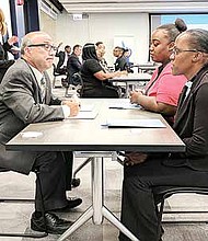 Underemployed and unemployed job seekers attend a job fair hosted by Skills and Walgreens. Photo Credit: Skills for Chicagoland’s Future