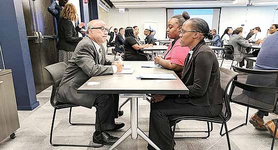 Underemployed and unemployed job seekers attend a job fair hosted by Skills and Walgreens. Photo Credit: Skills for Chicagoland’s Future