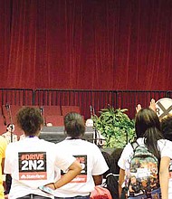 Lisa Cooper, community relations specialist at State Farm, explains during National Teen Driver Safety Week that teens should “drive two-and-two, which means two eyes on the road and two hands on the wheel.” Photo Credit: Christopher Shuttlesworth