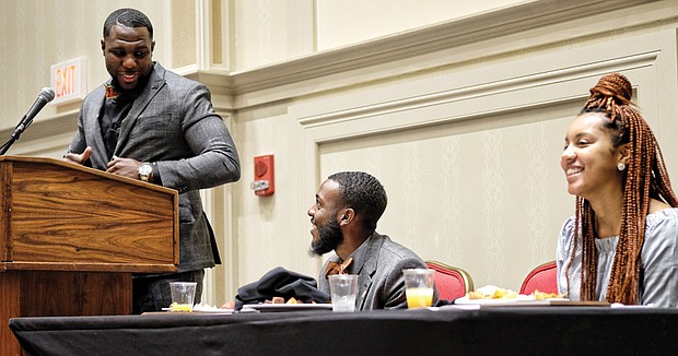 Charlottesville Vice Mayor Wes Bellamy, left, shares a laugh before speaking at the state NAACP Youth and College Division Leadership Breakfast on Sunday with Montae Taylor, the division’s new state president, and Danyelle Honor, president of the University of Virginia NAACP chapter.