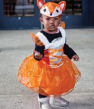 Trick or treat //
Tayarie Johnson, 1, is dressed for the occasion Tuesday in her fox costume for the annual Halloween party hosted by Richmond state Sen. Jennifer McClellan at the Siegel Center on the Virginia Commonwealth University campus.  