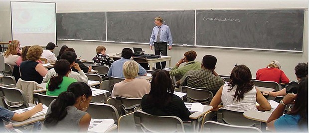 The Inaugural Disparities in Health in America: Working Toward Social Justice Class  in the Fall 2002 at the University of Houston with Dr. Francis Collin, current Director of the National Institute of Health.
